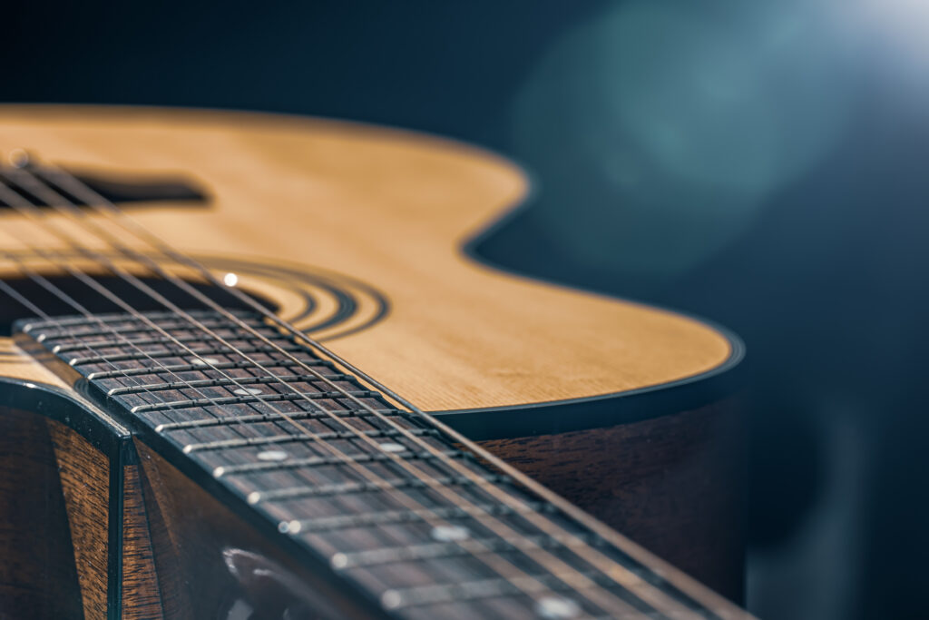 Guitar Experts | Endpinclose-up-of-a-classical-acoustic-guitar-in-beautif-2023-11-27-05-24-30-utc